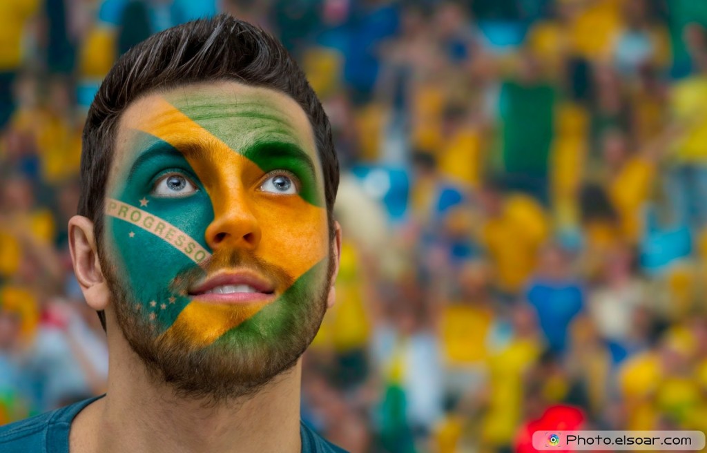 Brazilian painted the flag of Brazil on his face